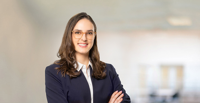 Woman with glasses in blazer