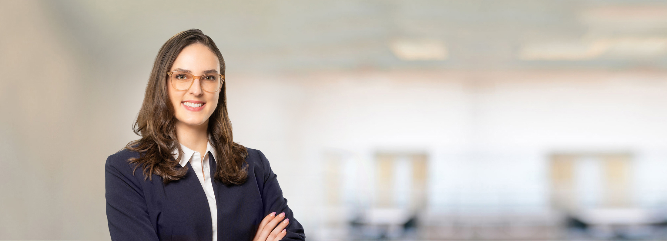 Woman with glasses in blazer